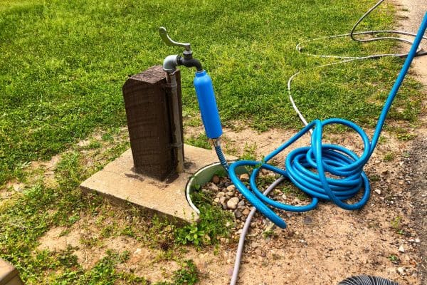 hose with water filter connected to an rv